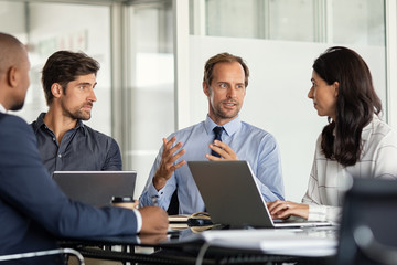 agm Man explaining in a meeting